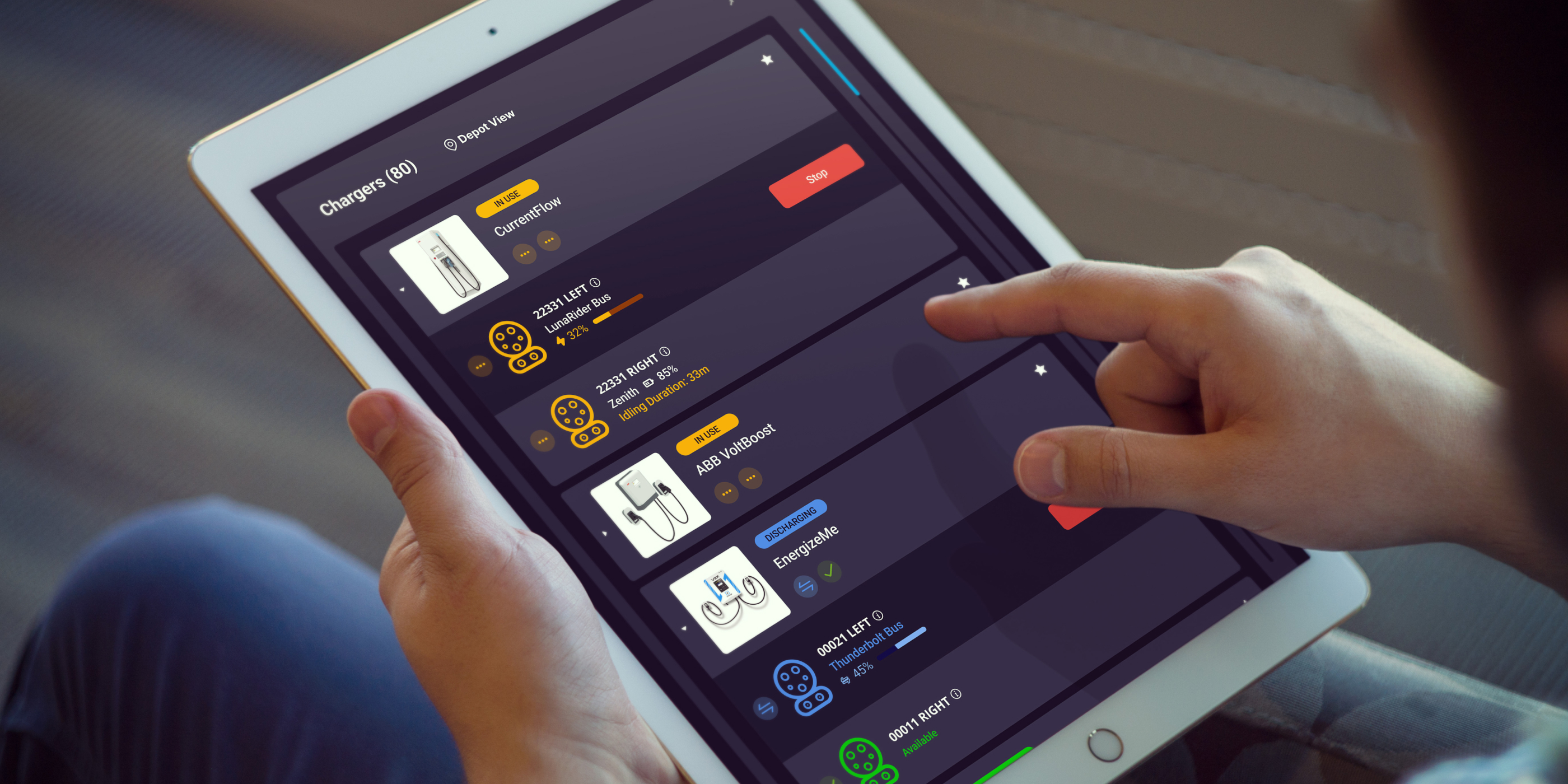holding a tablet looking at chargers on InControl